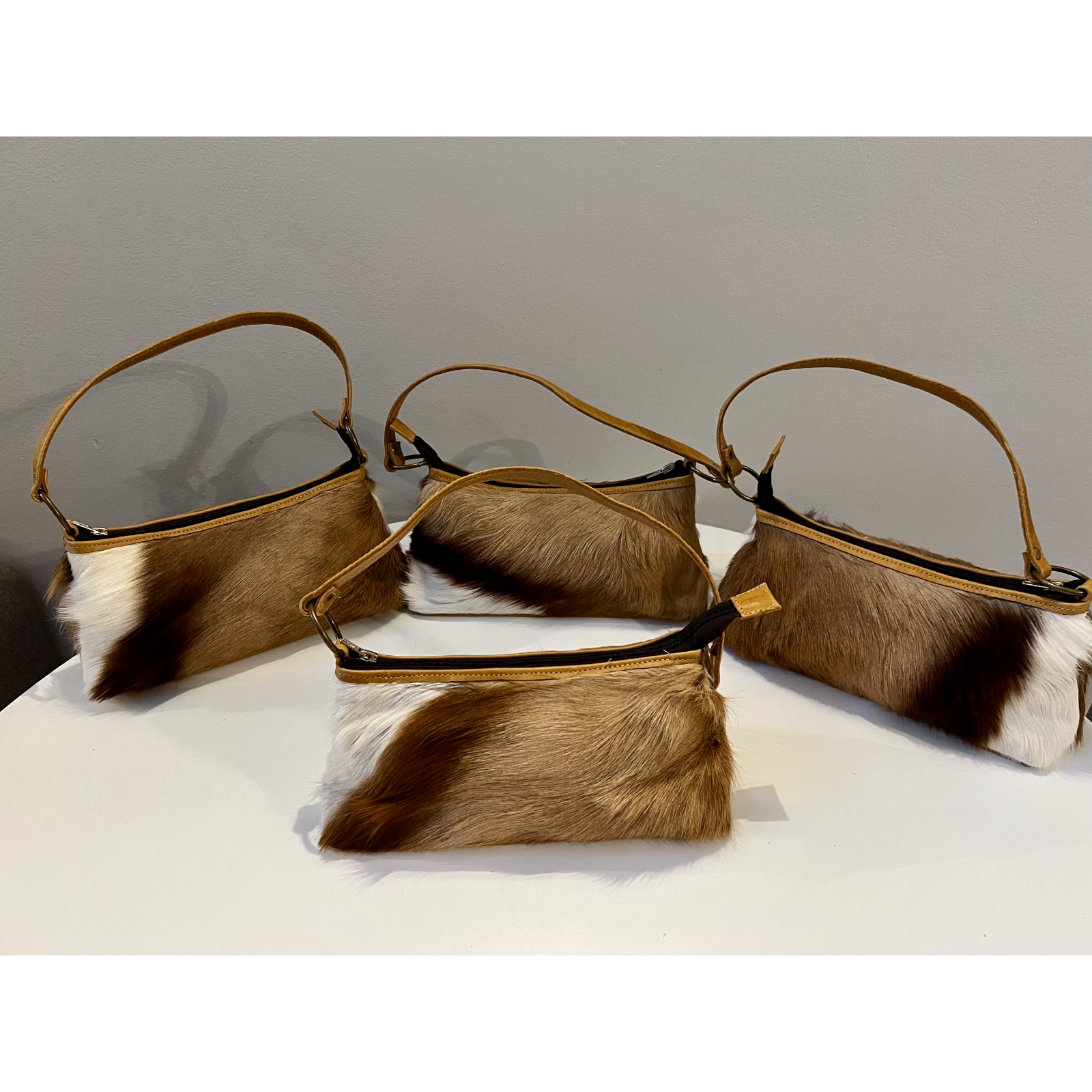 Genuine Springbok skin genuine leather clutch handbag collection